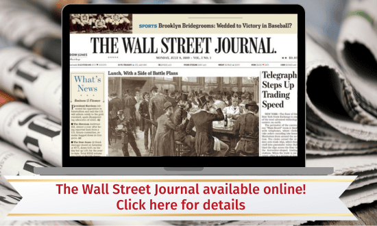 A laptop displays The Wall Street Journal front page, with text below reading, "The Wall Street Journal available online! Click here for details.